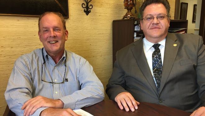 Mark Tetzlaff (left) and Joseph Seifert at their Milwaukee office.