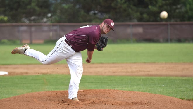 Stuarts Draft's Bryce Carter delivers a pitch in the first inning of the Cougars' VHSL Region 2A East quarterfinal game against Madison County on Monday, May 29, 2017, at Stuarts Draft High School.