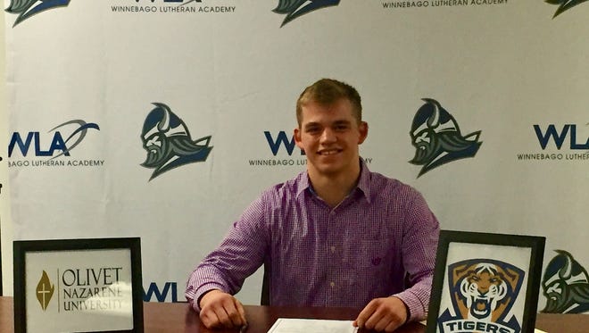 Winnebago Lutheran senior Grant Manke signed his letter of intent Wednesday to attend Olivet Nazarene University next year to play football.