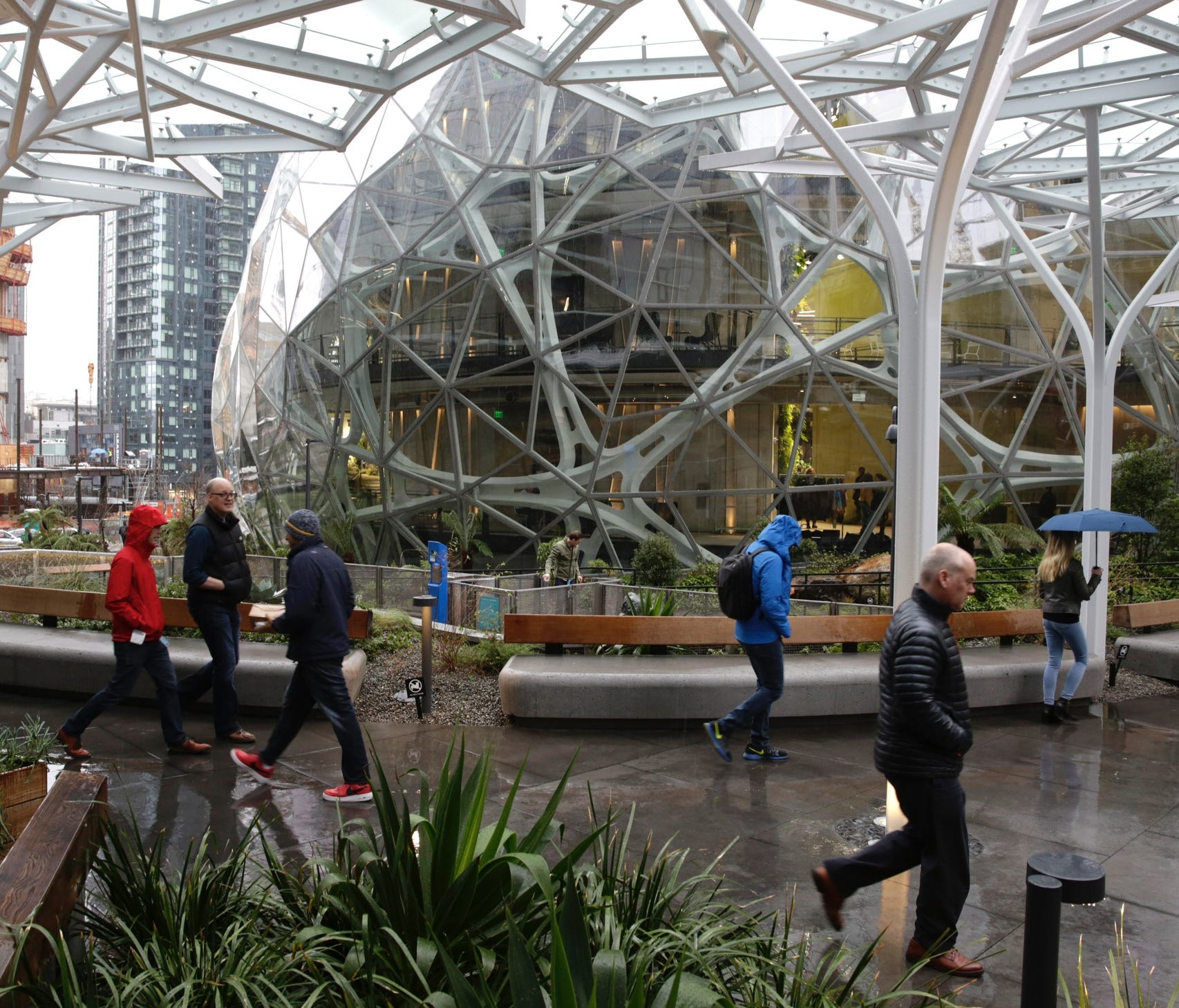 People take a tour during the grand opening of the Amazon Spheres in Seattle on Jan. 29, 2018.