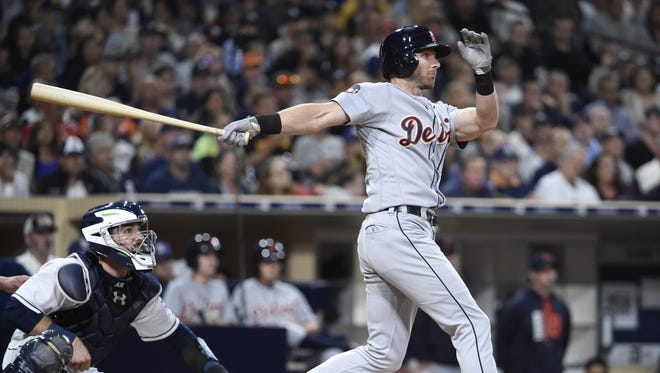 Tigers centerfielder Andrew Romine hits an RBI double during the fifth inning Saturday in San Diego.