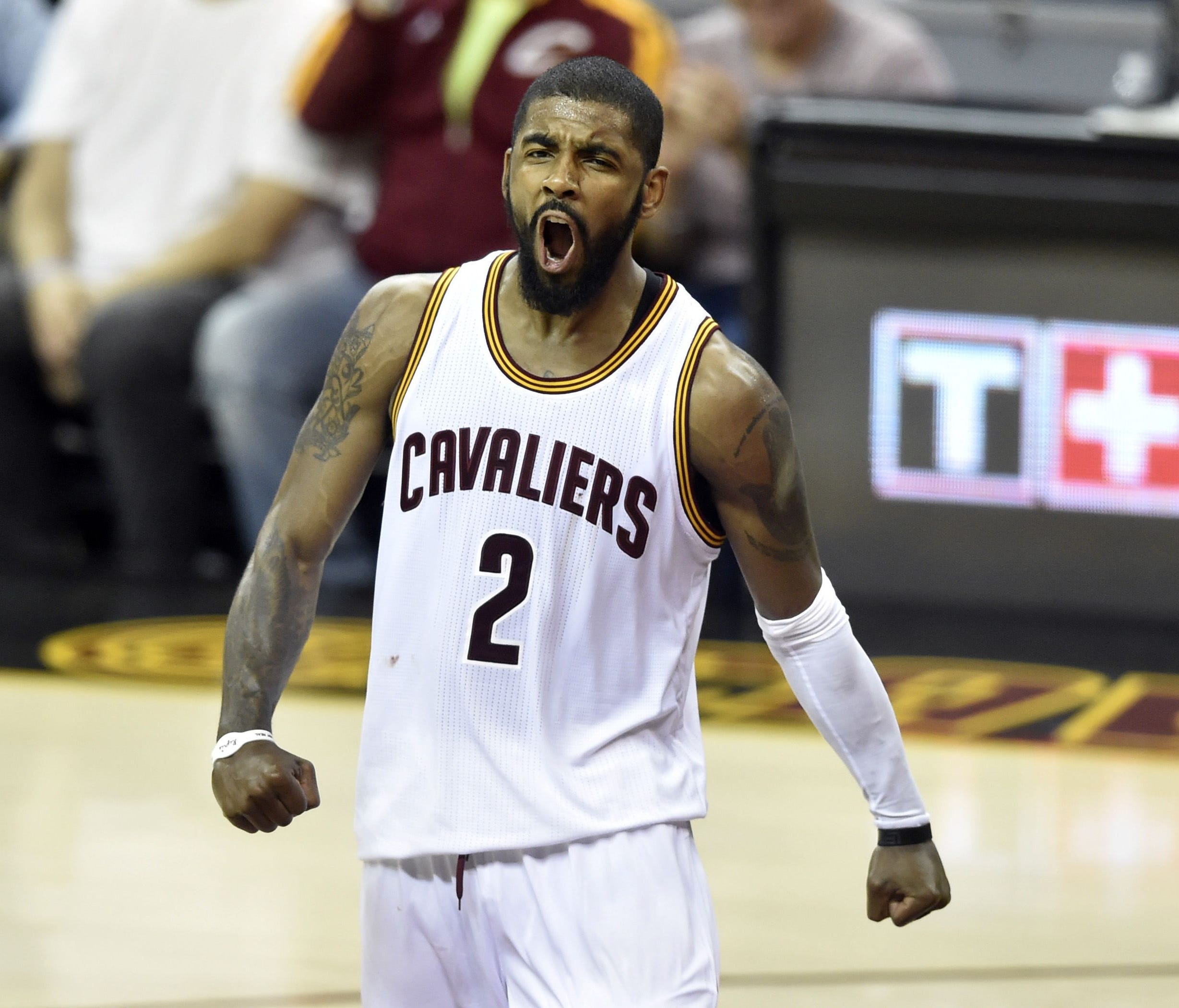 Cleveland Cavaliers guard Kyrie Irving (2) reacts after making a three-point basket at the end of the third quarter against the Boston Celtics in game four of the Eastern conference finals of the NBA Playoffs.