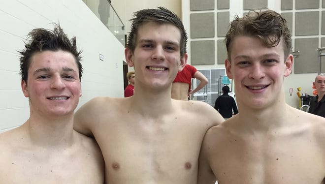 From left, Avon swimmers Grant Lewis, Chandler Bray and Parks Jones. They have led the Orioles to a No. 1 ranking as they bid for the school's first state championship in boys swimming. Feb. 21, 2015