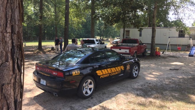 Perry County Sheriff's Department officials are on the scene where a vehicle matching the description of the one used in a shooting incident outside Camp Shelby was found today.
