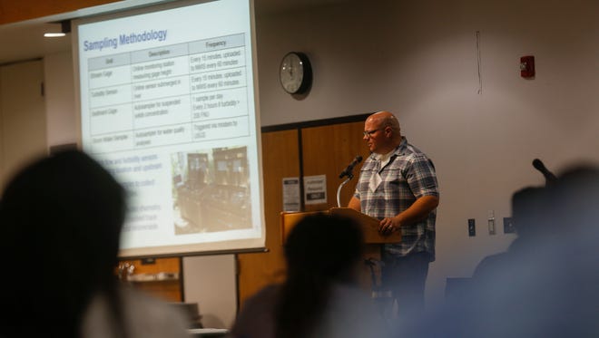 Jeb Brown, a hydrologist with the U.S. Geological Survey, gives a presentation during a water quality conference Wednesday at the San Juan College Henderson Fine Arts Center in Farmington.
