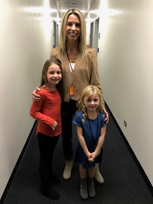 Carly Drum-O'Neill and her two daughters, Taylor and Keira O’Neill, in Los Angeles.