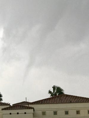 Indialantic Police Chief Michael Casey photographed this funnel cloud over the beachside town about 9:20 a.m. Sunday.