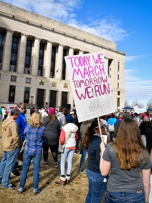Marchers gather during the Women's March at Public Square Park in Nashville, Tenn., Saturday, Jan. 20, 2018.