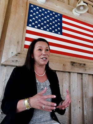 U.S. Representative Martha Roby pauses to talk with the media while campaigning at a fish fry in Andalusia, Ala., on Wednesday May 30, 2018.