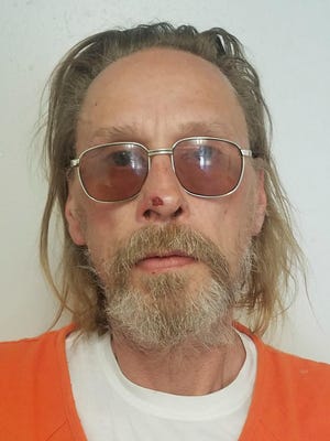 This undated booking photo released by the Costilla County Sheriff's Office shows Jesper Joergensen. Joergensen, accused of starting a Colorado wildfire that has forced the evacuation of more than 2,000 homes, acknowledged building a fire on land where he has been living but said he made sure it was out, a court document says. Jesper Joergensen, 52, initially said he had started a fire to burn trash on land where he has been living in a camper but then said he had been grilling in a permanent fire pit the day before the wildfire started, the document states. Joergensen, who is from Denmark, is being held in jail and is scheduled to appear in court Tuesday, July 2, 2018. (Costilla County Sheriff's Office via AP)