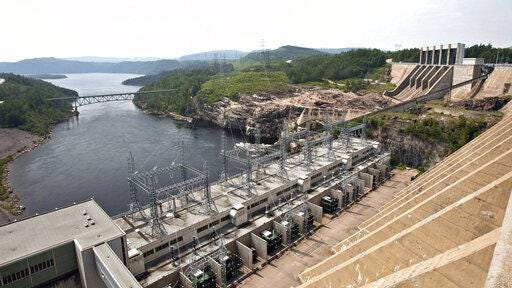 In this June 2010 photo, the Jean-Lesage hydro electric dam generates power along the Manicouagan River north of Baie-Comeau, Quebec. Central Maine Power and Hydro Quebec have spent nearly $17 million in support of a $1 billion hydropower transmission project.