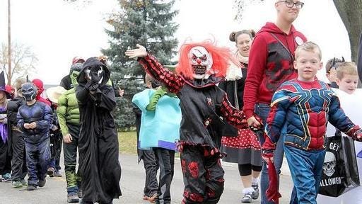 Area youth parade in their costumes in 2018.