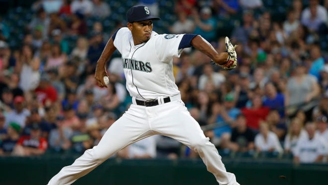 Seattle Mariners reliever Edwin Diaz throws against the Cleveland Indians in the seventh inning of a baseball game, Monday, June 6, 2016, in Seattle. (AP Photo/Ted S. Warren)