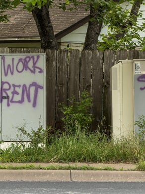 Graffiti that says &ldquo;no work no rent&rdquo;and &ldquo;strike&rdquo; can be seen in a West Gate Boulevard neighorhood last month. The city of Austin is starting a $1.2 million lottery program to help people who have been financially affected by the coronavirus crisis pay their rent.