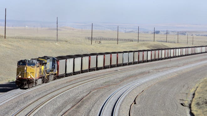 In this Aug. 22, 2006 file photo, a coal train travels in northeast Wyoming near Gillette. (AP Photo/Nati Harnik, File)