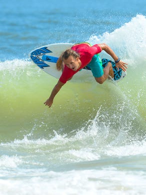 Lucas McCoy, Dewey Beach, catches a wave during the Men's Pro Division heat in the semifinals of the Skim USA Association ZAP Pro/Am Skimboarding Competition in Dewey Beach, De. on Friday, August 11, 2017.