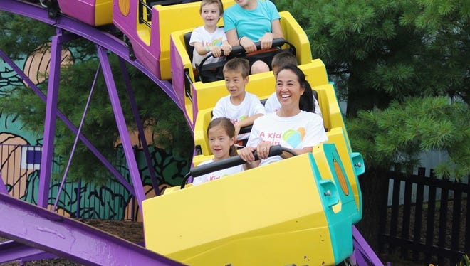 A Kid Again is bringing kids suffering from life-threatening injuries and their families to Kings Island for its annual outing.