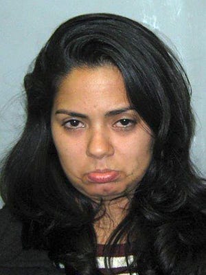 This booking mug shot, provided by the Port Authority of New York/New Jersey, shows Karol Andino, who was arrested on a DWI charge, after stopping her car near the Holland Tunnel entrance in Jersey City. When she told them she was "looking for New Jersey," the officers told her that's where she was. But Andino continued to say she was "looking for New Jersey," and she was charged a short time later.