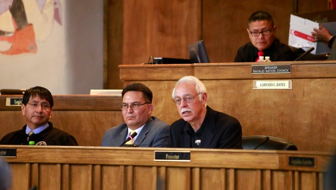Acting Controller Jim R. Parris, lower right, talks to the Navajo Nation Council in January during the discussion on the bill to confirm his appointment in Window Rock, Ariz.