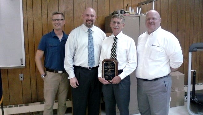 Dr. Steven A. Meador has been named the recipient of the 2016 Ralph Backenstoes Lifetime Achievement Award. Pictured at the award ceremony Wednesday, Sept. 14, are, from left Steve Mrozowski, president of the Lebanon County Ambulance Association; Dr. Eric Gajewski, assistant director of Good Samaritan Emergency Medicine; Meador; and Scott Buchle,  manager of Life Lion EMS.