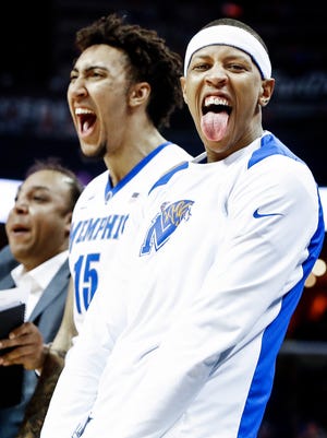 Memphis teammates Jimario Rivers (right) and David Nickelberry (left) celebrate on the bench during second half action against Cincinnati at the FedExForum in Memphis Tenn., Saturday, January 27, 2018.