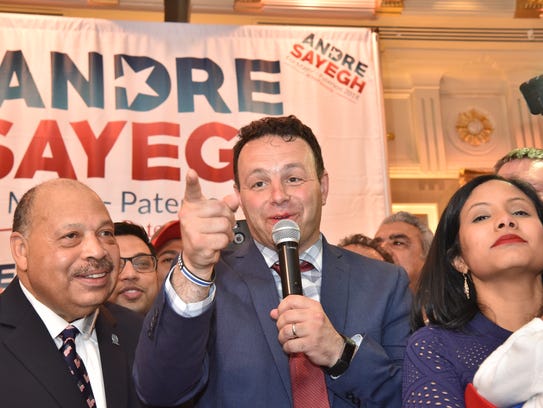Andre Sayegh celebrates victory as the new Mayor Elect