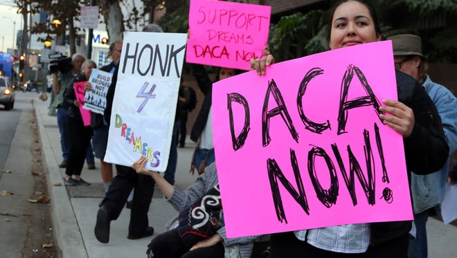 Demonstrators supporting the Deferred Action for Childhood Arrivals (DACA) program rally outside the office Sen. Dianne Feinstein, D-Calif., in Los Angeles on Jan. 3, 2018.