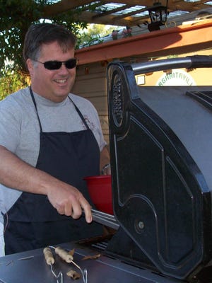 Kent Whitaker will grill just about anything — from porterhouse steaks to pineapple to pimiento cheese sandwiches to pizza to pound cake.