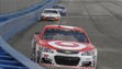 Eventual winner Kyle Larson (42) leads a group during