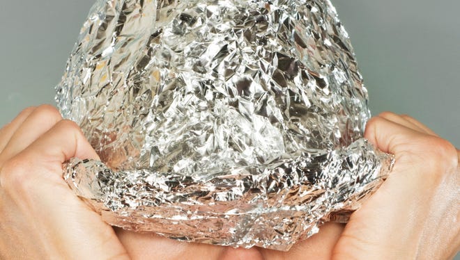 tin foil hatEverything the Arizona Corporation Commission needed to know about smart meters walked in on one woman's head.
