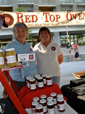 Jane Ford and Kathy Hubbard sell their products at Farmers Market of the Ozarks.
