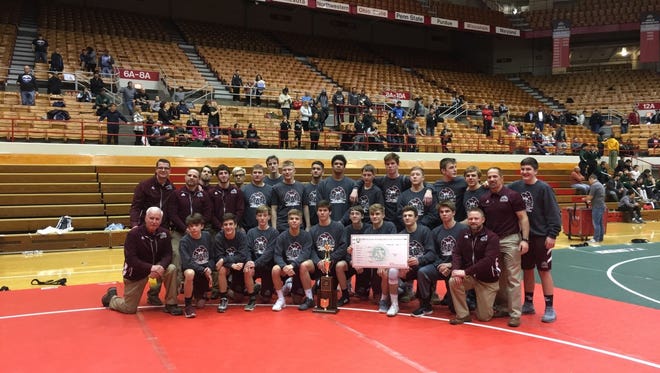 Genoa’s wrestling team earned the first state championship in school history at the team dual tournament.