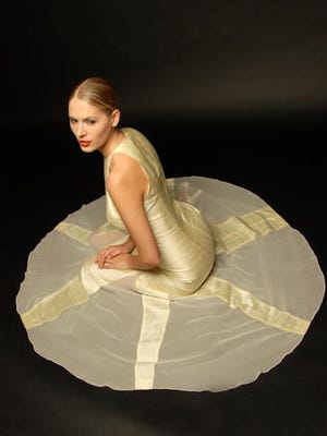 Silk monochromatic pin-wheel gown. Architectural and elegant.
