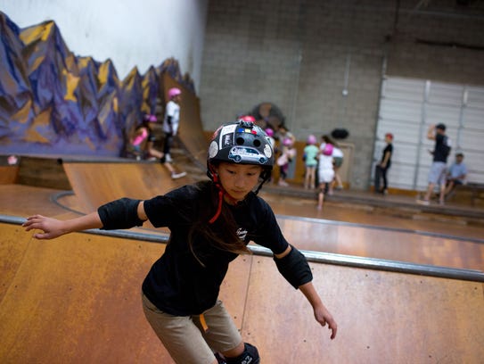 Mia Lovell, 10, of Phoenix has learned the skateboarding