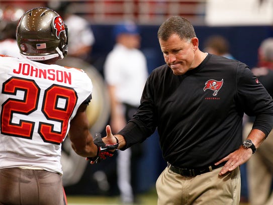 Tampa Bay Buccaneers head coach Greg Schiano greets