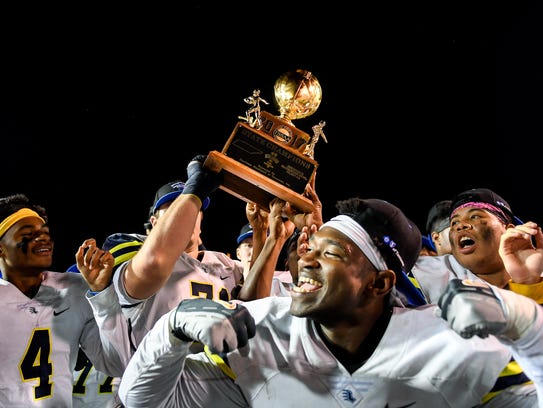 Lausanne players celebrate with their trophy after