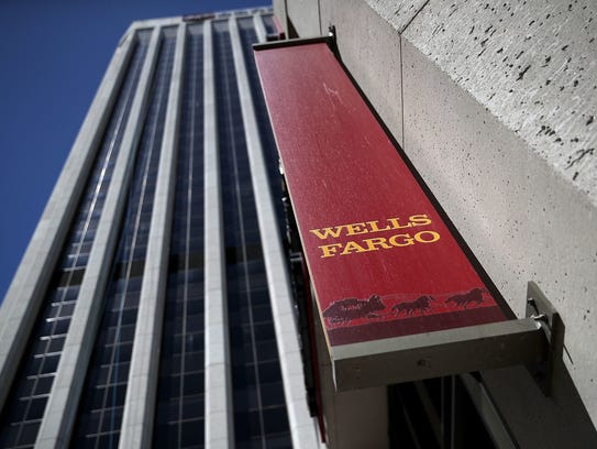 File photo taken in 2017 shows a Wells Fargo sign outside
