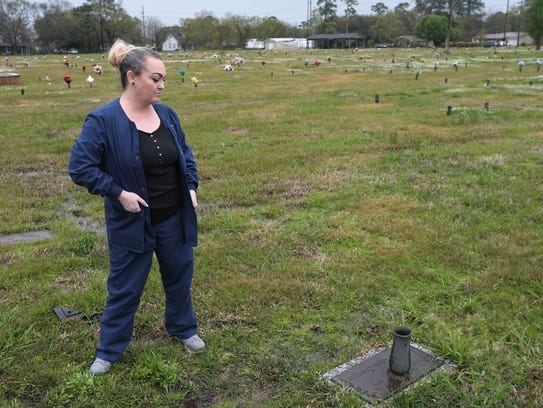 Amber Sawyer stands near her sister Donna Sawyer's