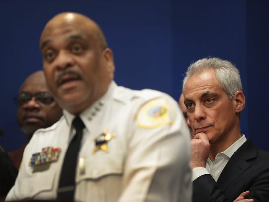Mayor Rahm Emanuel and Police Superintendent Eddie Johnson hold a press conference flanked by community activists, local politicians and families of gun violence victims to urge Illinois Gov. Bruce Rauner to sign a gun legislation bill that has been approved by the Legislature on March 12, 2018, in Chicago.