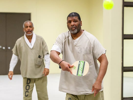 Inmates Melvin Coleman (right) and Derrick Smith of