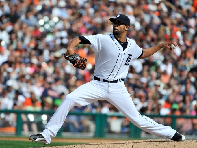 Tigers pitcher David Price throws a strikeout pitch to Twins' Oswaldo Arcia in the sixth inning for Price's 270th strikeout.