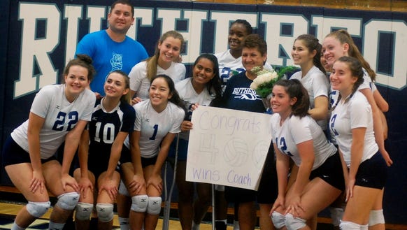 NJIC Colonial Division girls volleyball champ Rutherford helped coach Helen Antzoulides (center) garner her 400th career win in 2017.