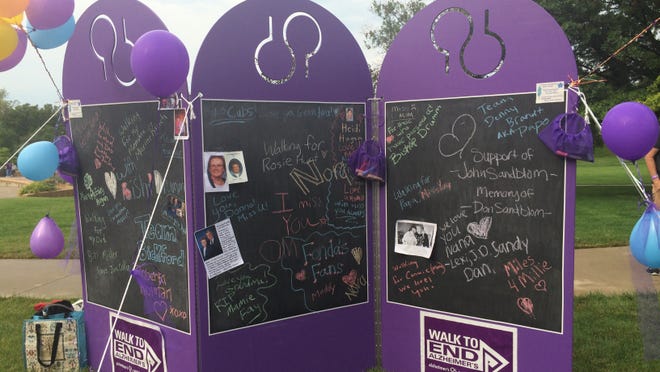 
Notes in memory of loved ones who died of Alzheimer’s disease were written on chalkboards at the Walk to End Alzheimer’s at the Des Moines Capitol building on Saturday, Sept. 20, 2014.

