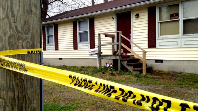 Police tape outside of the home in which Rodney Todd and his children were discovered dead as the result of  Carbon Monoxide poisoning.