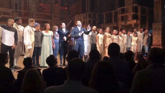 Hamilton LLC via AP
In this image made from a video provided by Hamilton LLC, actor Brandon Victor Dixon who plays Arron Burr, the nations third vice president, in "Hamilton" speaks from the stage after the curtain call in New York, Friday, Nov. 18, 2016. Vice President-elect Mike Pence is the latest celebrity to attend the Broadway hit "Hamilton," but the first to get a sharp message from a cast member from the stage. (Hamilton LLC via AP) ORG XMIT: NY107