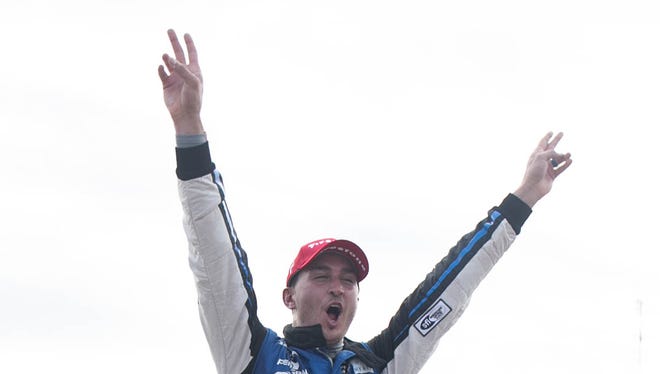 A whirlwind day ended in celebration for Graham Rahal, who won Saturday's Dual in Detroit on Belle Isle for his fifth career Verizon IndyCar Series victory.