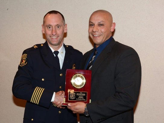 2016 Police Officer of the Year Ibrahim Sleiman (right),