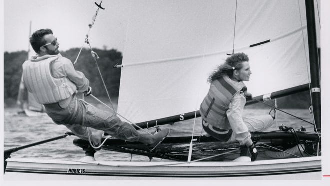 Richard Bordelon and Nancy Hockenburg participate in a catamaran race on Stockton Lake in 1989.