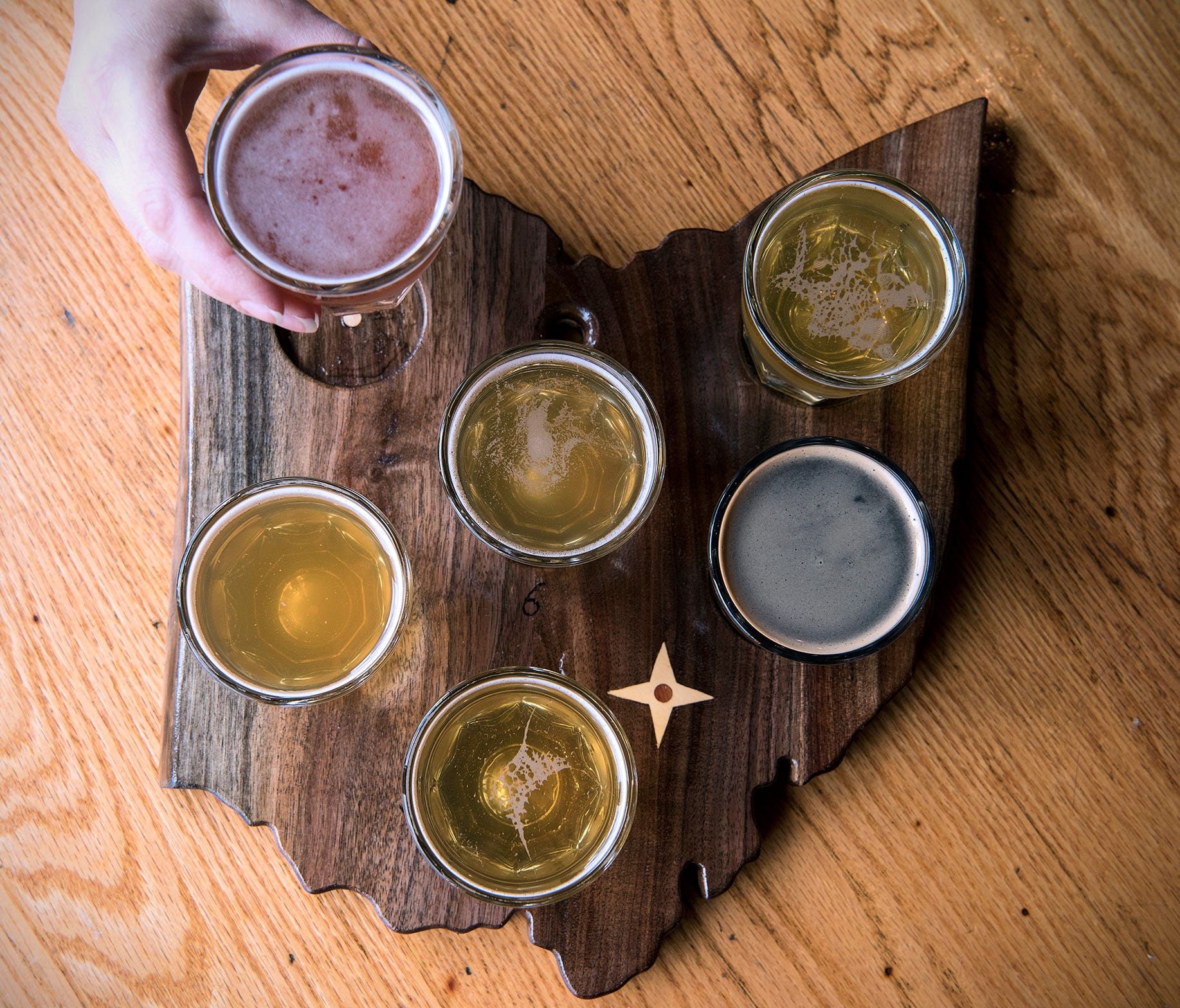 The trail includes Jackie O's Taproom and Production Brewery, which began in 2005, making it the oldest brewery in Athens, Ohio. Customers can purchase a flight of beers served on an Ohio-shaped board.