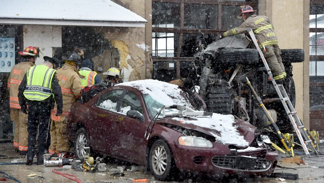 Crews worked to free someone trapped in a vehicle after a crash into a building in Dover on Friday morning, according to Northern York County Regional Police. The crash occurred at 9:29 a.m. in the 100 block of South Main Street in the borough. Minor injuries were reported, police said.
